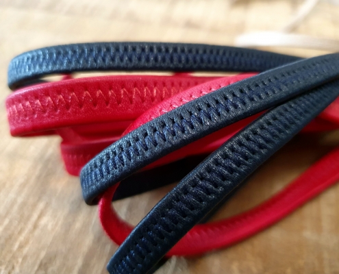 Elastici incollati e cuciti in pelle e sintetico Elastici incollati e cuciti in pelle e sintetico